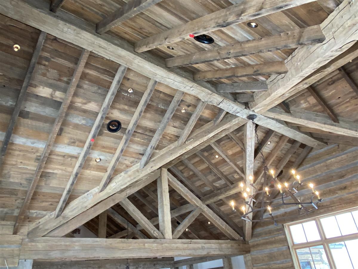 Heavy timber frame trusses inside a luxury home in Idaho built by Chase Construction